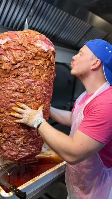 Preparing the al pastor spit
